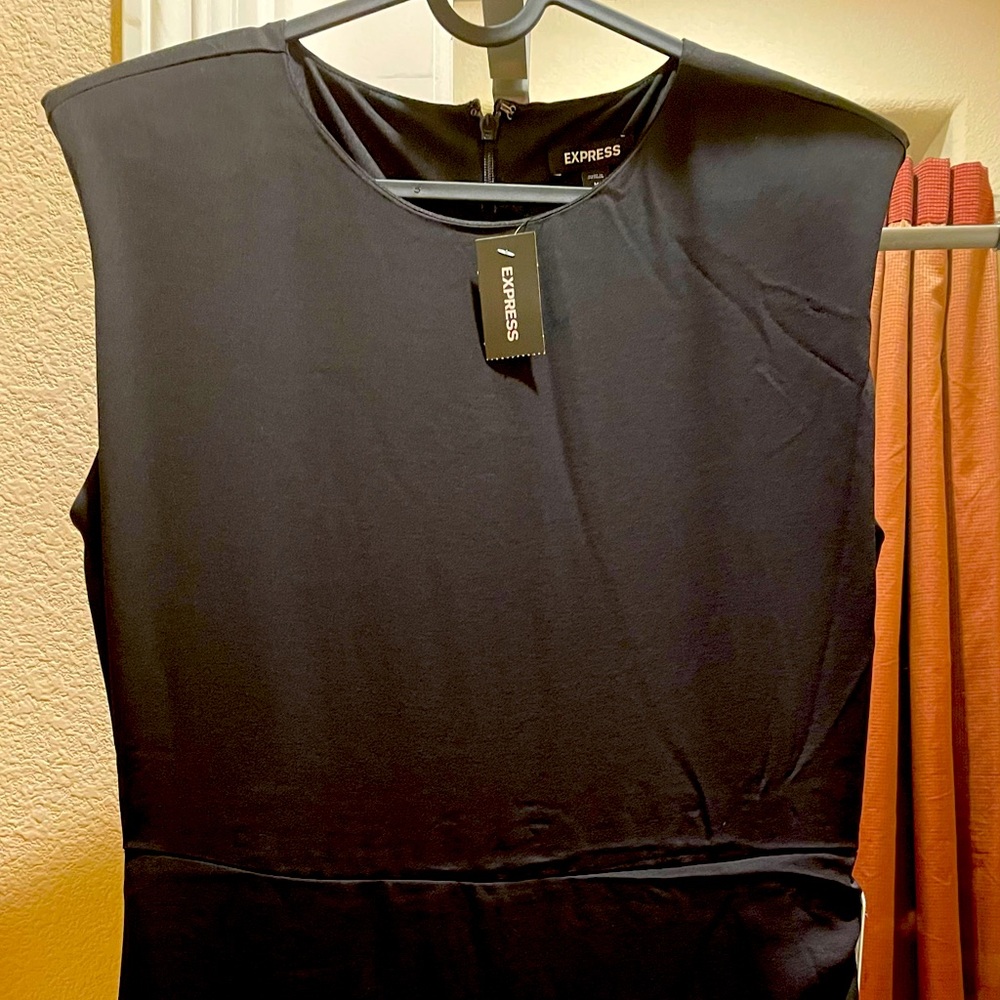 New with tags. Express medium black satin dress, padded short sleeves